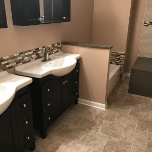 Bathroom Remodeling In Hanover Park - natural stone tile and backsplash