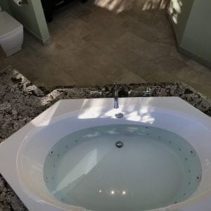 Master Bathroom Remodeling In Hoffman Estates- granite countertops, new flooring