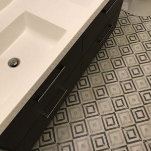 Commercial Property Bathroom remodeling in Streamwood IL - new tile, sink, flooring, countertops, cabinets