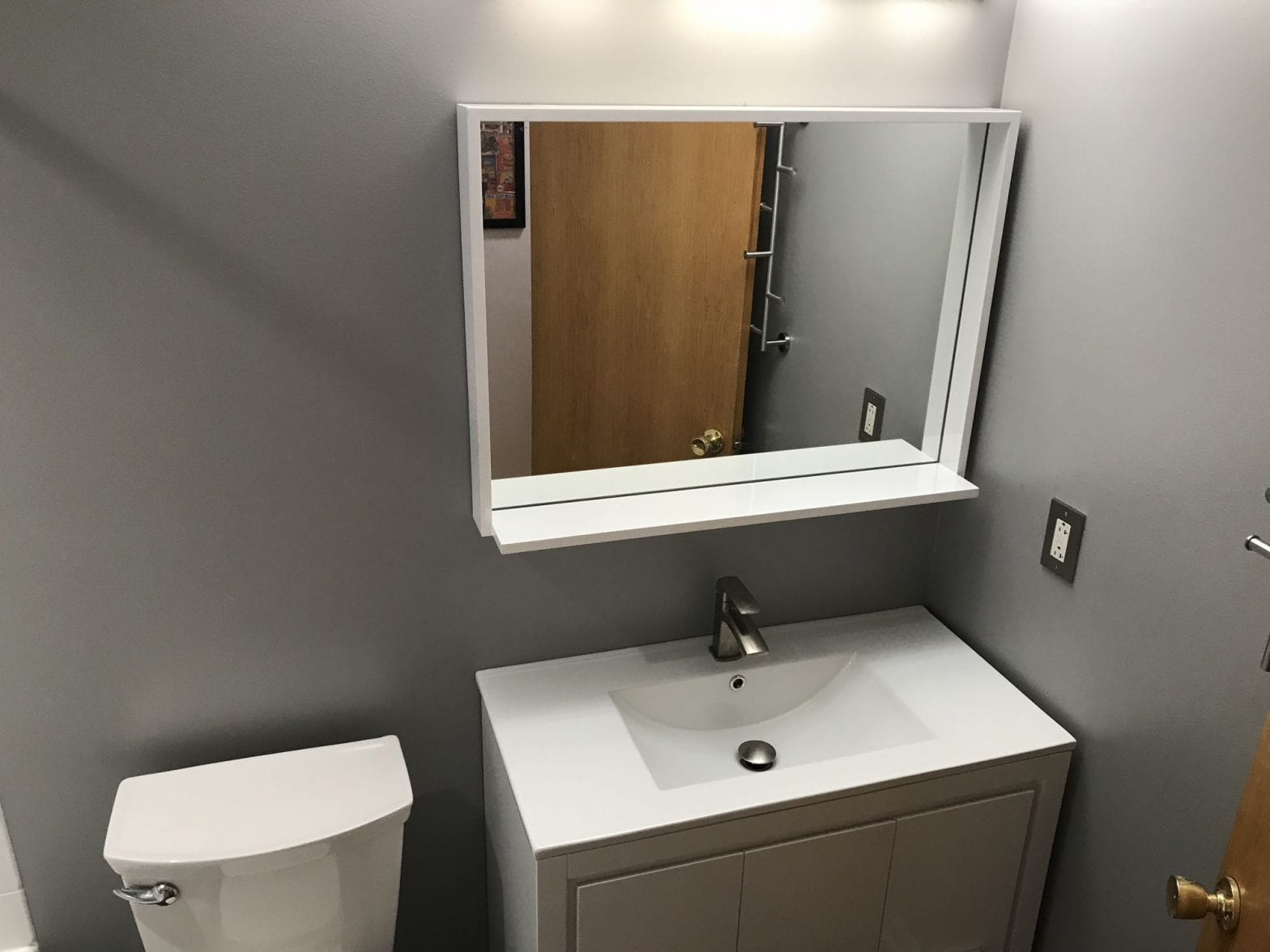 Bathroom remodeling in Schaumburg - new sink, paint, vanity mirror