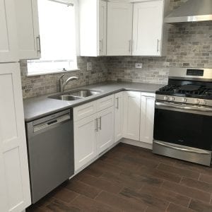 Chicago kitchen remodeling, stone backsplash, stone tile flooring countertops, new kitchen cabinets