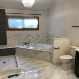 Bathroom Renovation in Schaumburg IL, new tub, tiles shower, tile flooring and bathroom cabinets