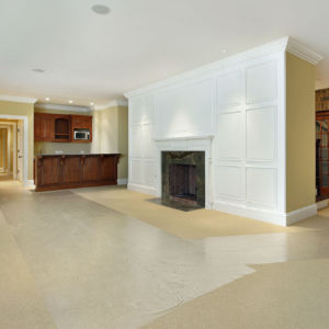 Basement of new construction home with fireplace Basement With Fireplace And Bar